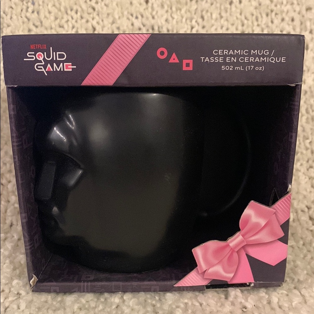 Squid Games  character mug, 17 ounce capacity.